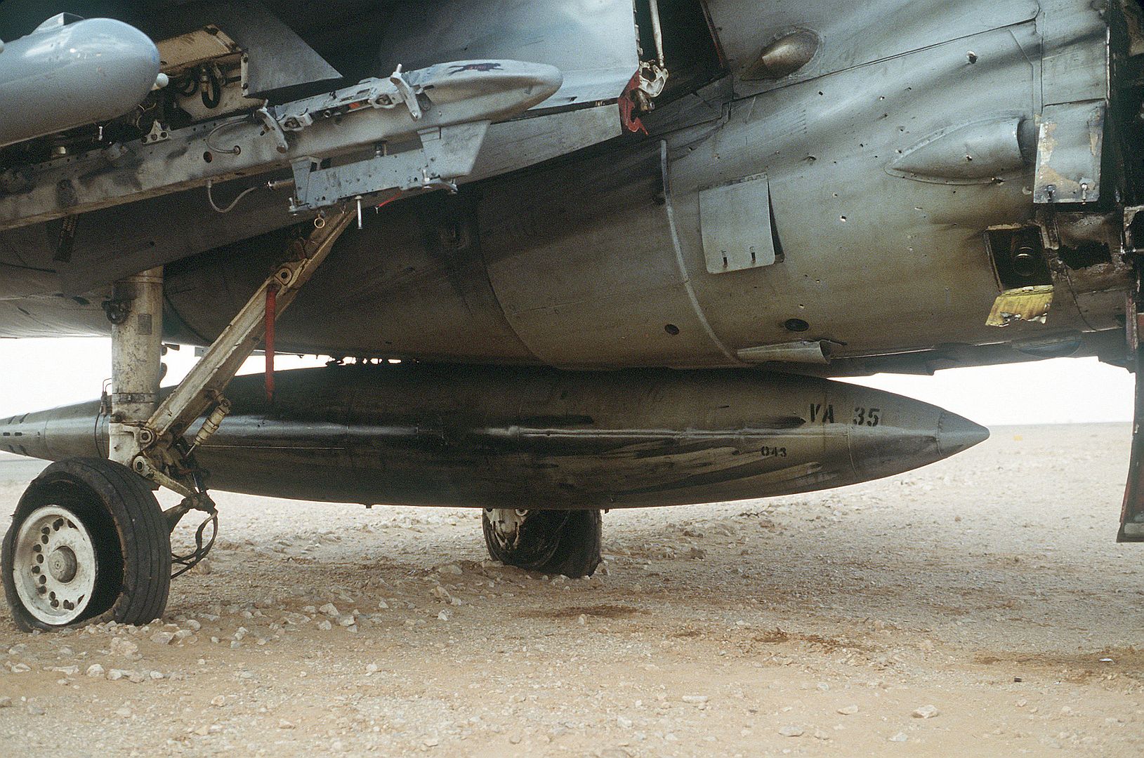 A 6E Intruder Attack Aircraft From Attack Squadron 35 Deployed From The Aircraft Carrier USS SARATOGA Shows Battle Damage From A Mission At The Start Of Operation Desert Storm 7