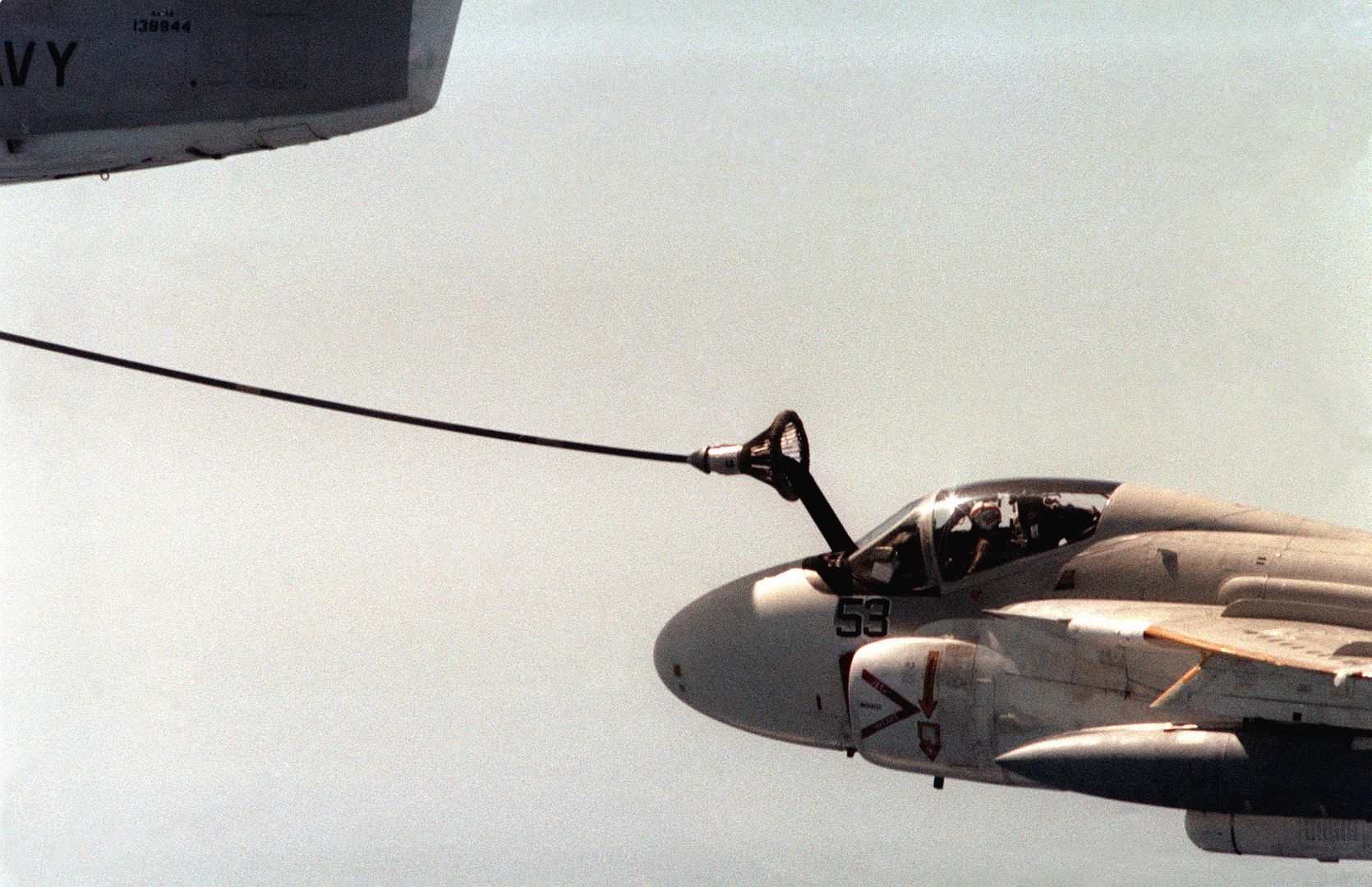 A 6 Intruder Aircraft Is Refueled During Its Flight To Follow A Tomahawk Submarine Launched Cruise Missile To Its Target On The Tonapah Test Range In Nevada
