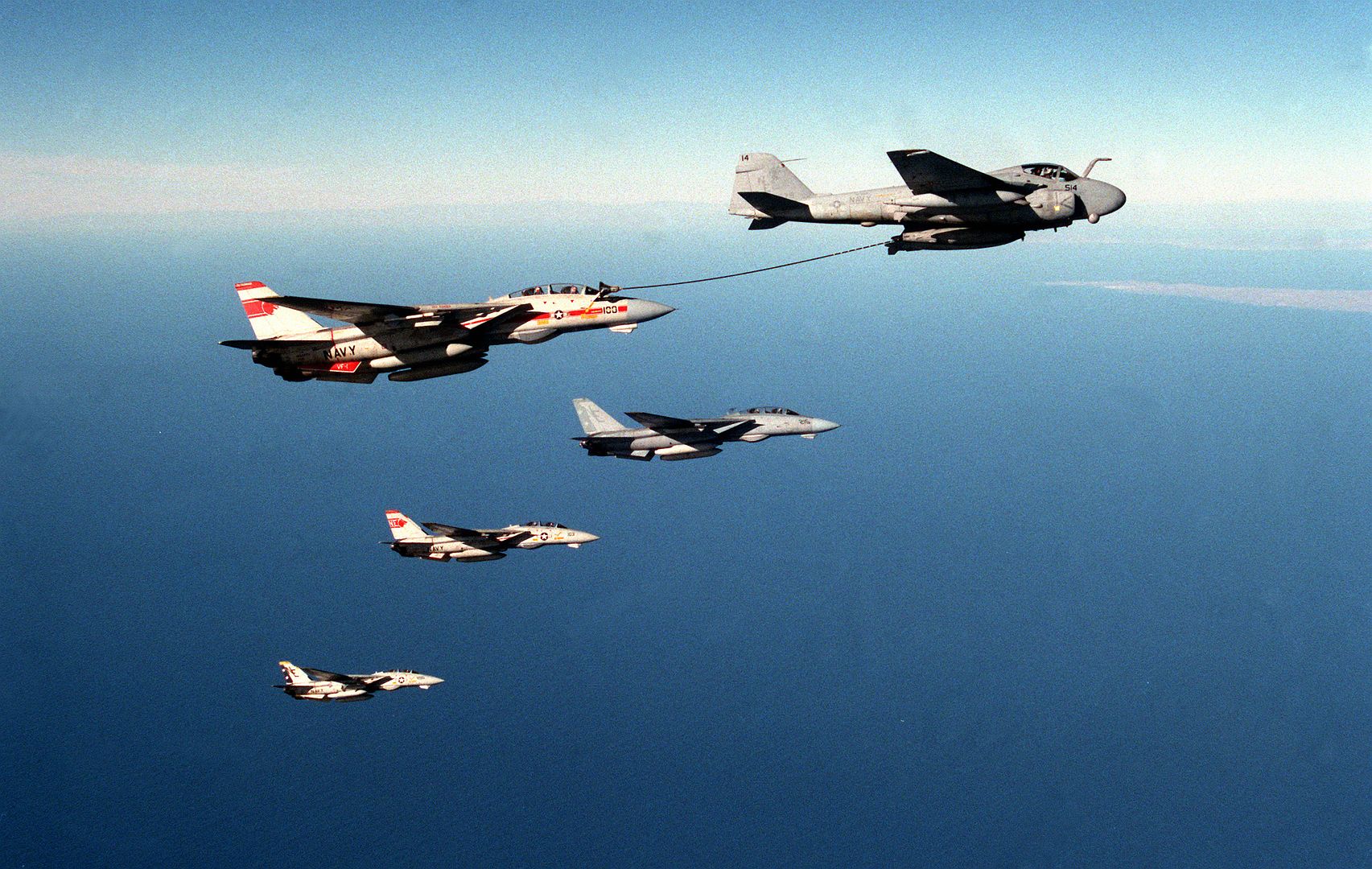 A Fighter Squadron 1 F 14A Tomcat Aircraft Receives Fuel From An Attack Squadron 145 A 6E Intruder
