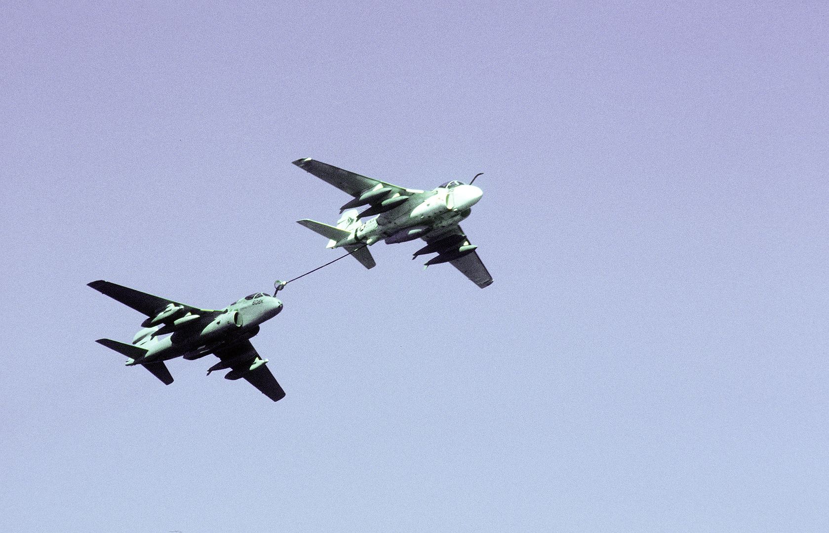 A KA 6D Intruder Aircraft Front Refuels An EA 6B Prowler Aircraft While In Flight