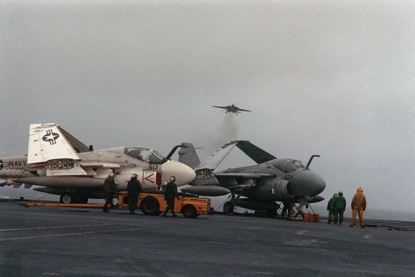A KA 6D Intruder Aircraft Left And An A 6E Intruder Aircraft Are Serviced On The Flight Deck Of The Aircraft Carrier USS FORRESTAL In The North Atlantic Ocean During Exercise TEAM WORK 88