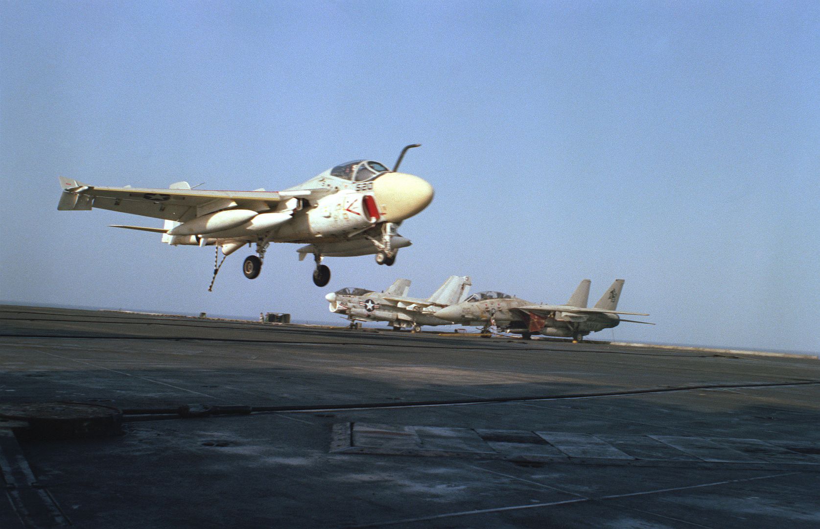  In The Background Are An A 7E Corsair II And An F 14A Tomcat Aircraft