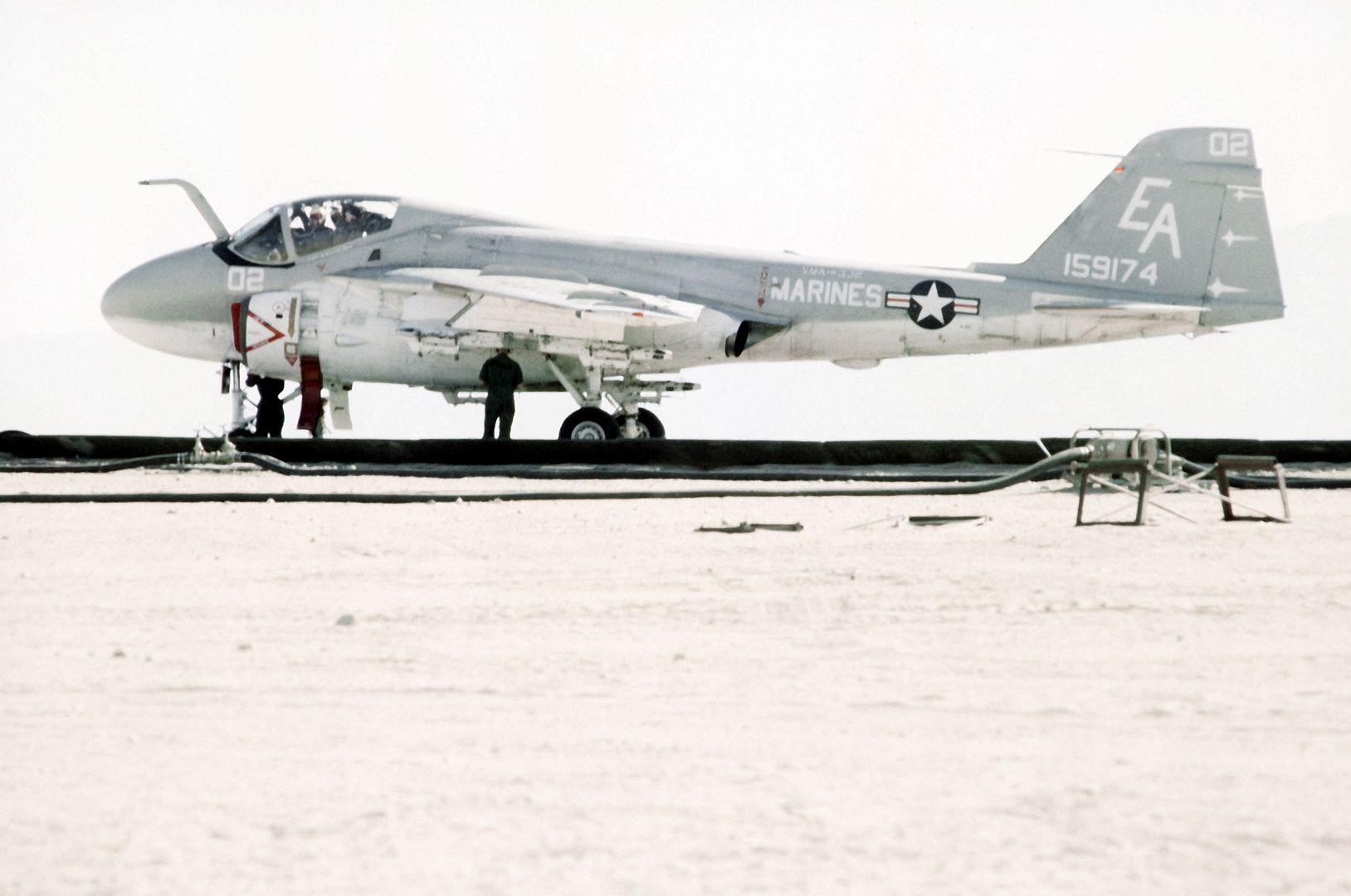 A Marine A 6A Intruder Aircraft Is Given The Final Check By A Lineman And The Crew Chief Prior To Take Off During Operation CAX 1 2 82 At The Marine Corps Air To Ground Combat Center