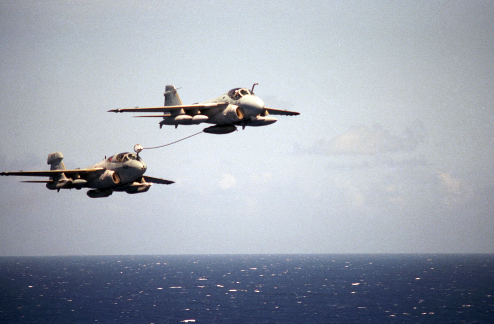 A Right Front View Of An A 6E Intruder Aircraft Refueling An EA 6B Prowler Aircraft During An Air Power Demonstration By The Air Wing Of The Nuclear Powered Aircraft Carrier USS CARL VINSON
