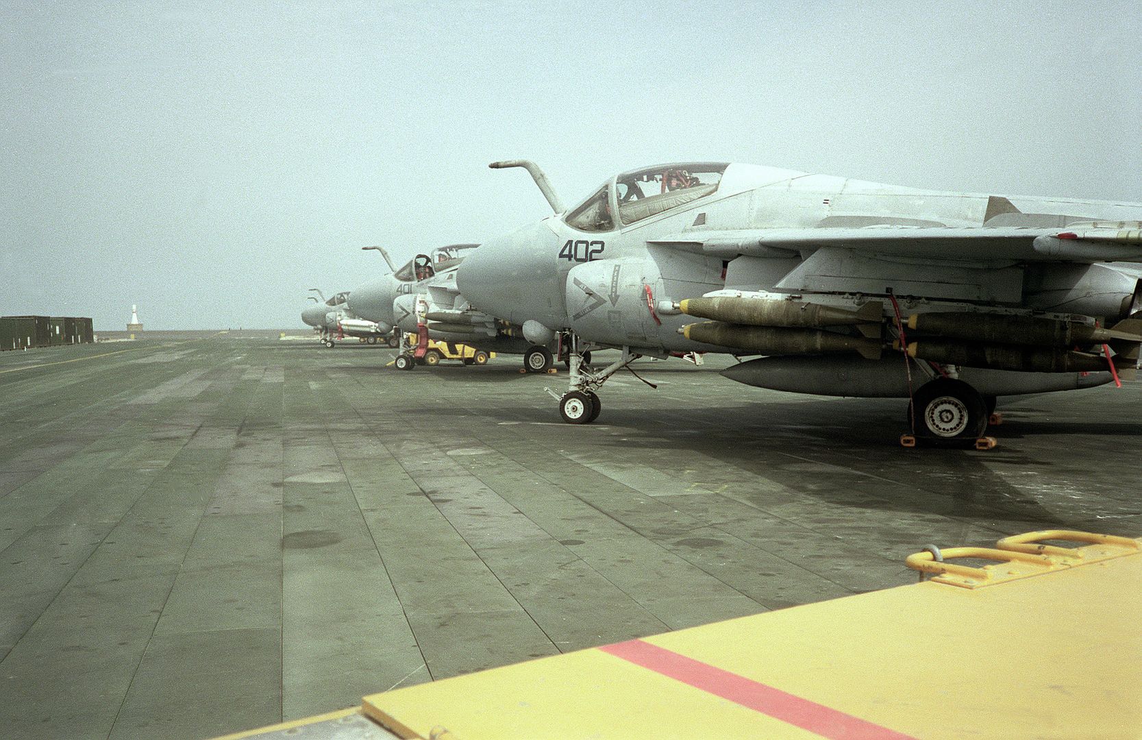 A View Of Marine Aircraft Group 11 A 6E Intruder Aircraft Sitting On The Flight Line With Full Ordnance Loads During Operation DESERT STORM