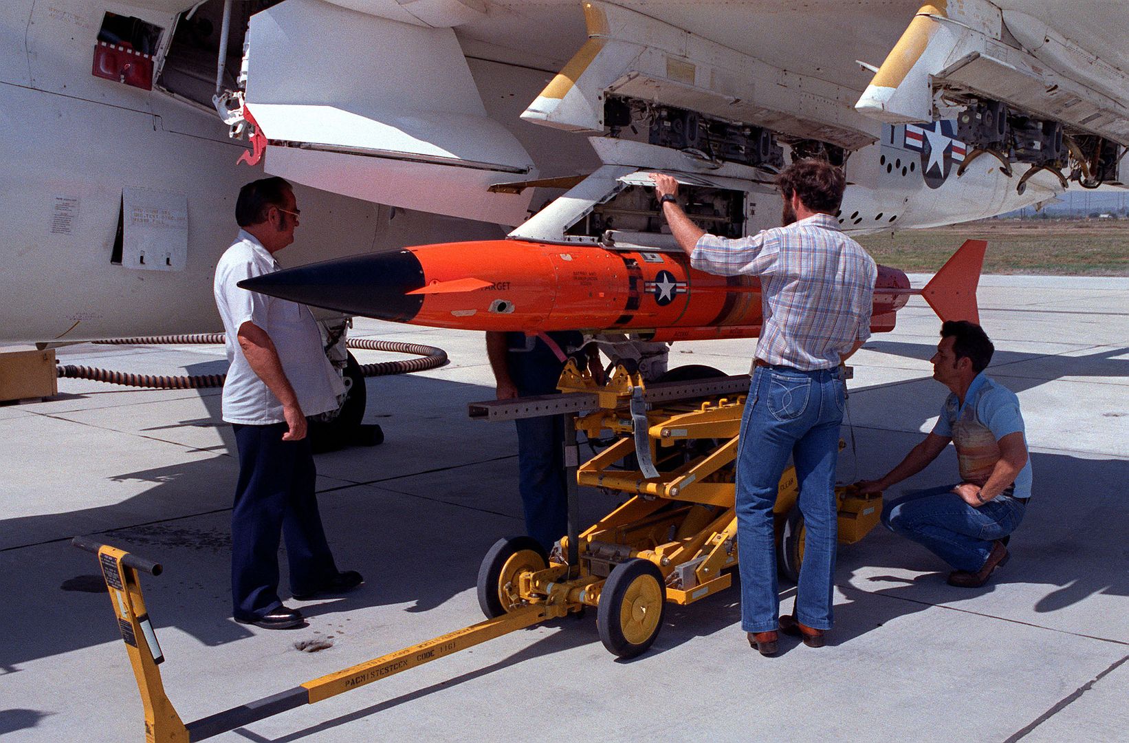 An AQM 37A Target Is Uploaded Onto The Wing Of An A 6E Intruder Aircraft At The Pacific Missile Test Center 1