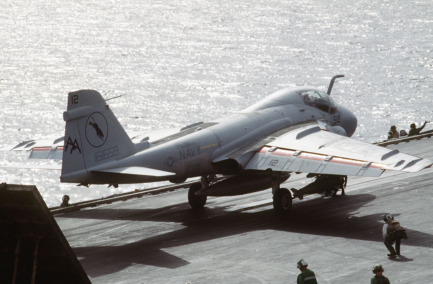 An Attack Squadron 35 A 6E Intruder Aircraft Receives A Final Check Before Launch On The Flight Deck Of The Aircraft Carrier USS SARATOGA