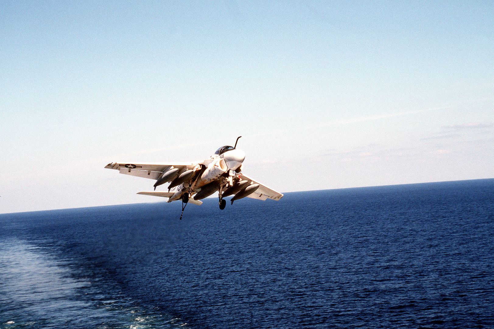 An Attack Squadron 95 KA 6A Intruder Aircraft Breaks Out Of The Landing Pattern After Being Waved Off By The Landing Signal Officer Aboard The Flight Deck Of The Nuclear Powered Aircraft Carrier USS ABRAHAM LINCOLN