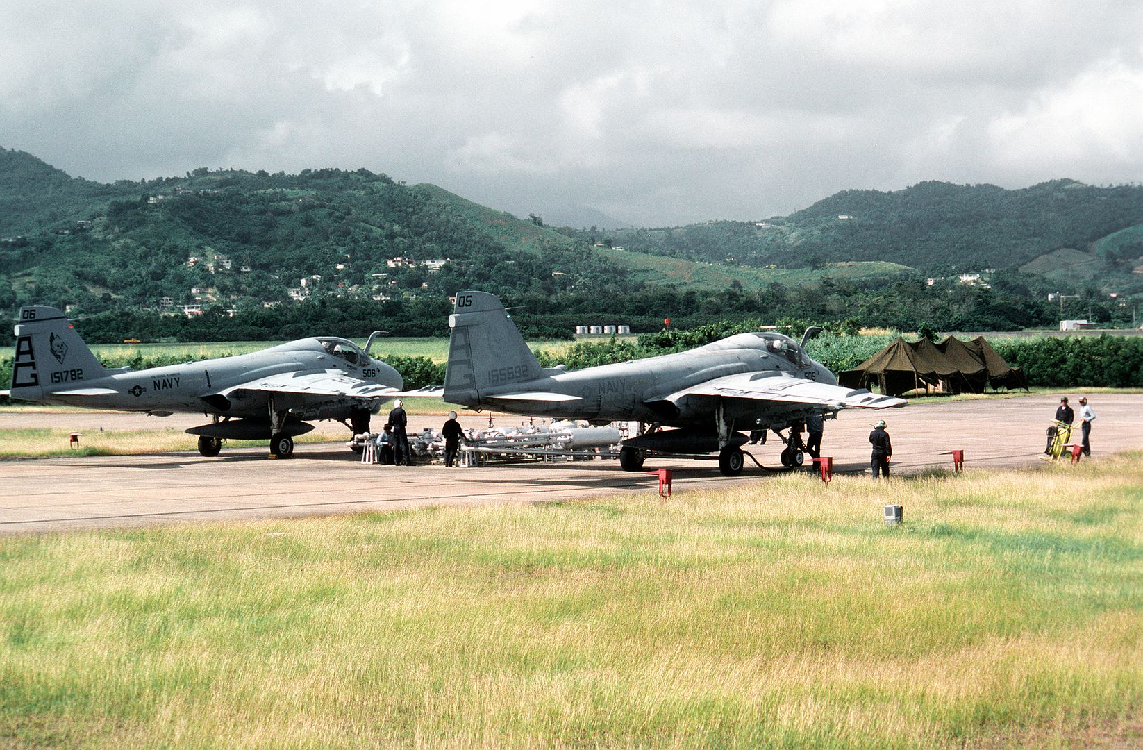 Attack Squadron 34 A 6E Intruder Aircraft Are Refueled On The Flight Line