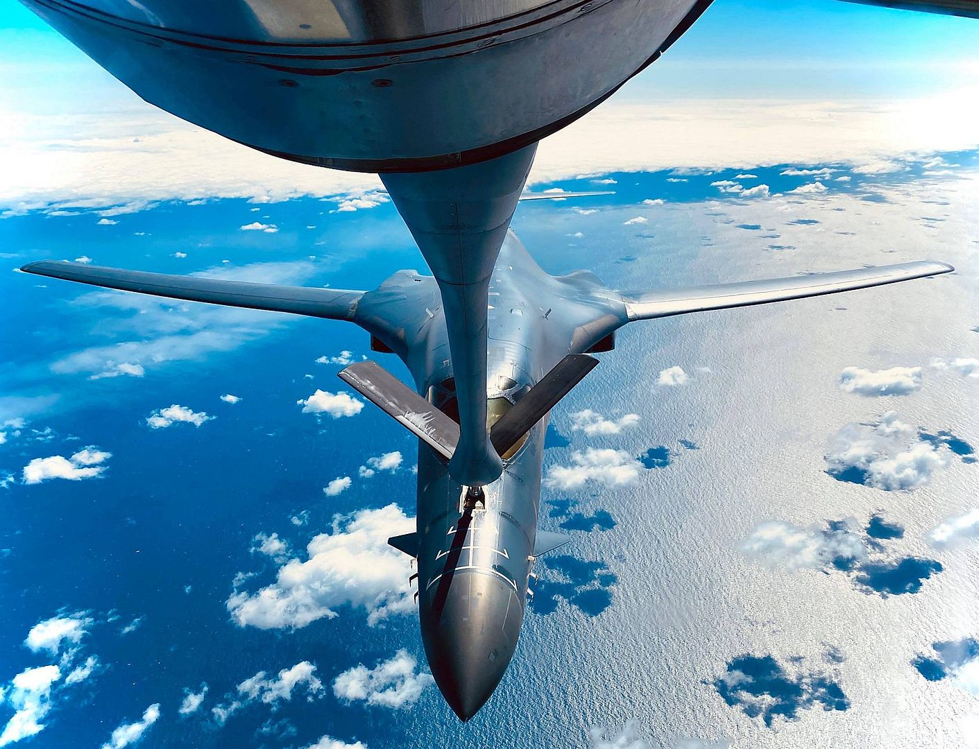 B 1B Lancer From The 28th Bomb Wing Ellsworth Air Force Base South Dakota Receives Fuel From A KC 135 Stratotanker