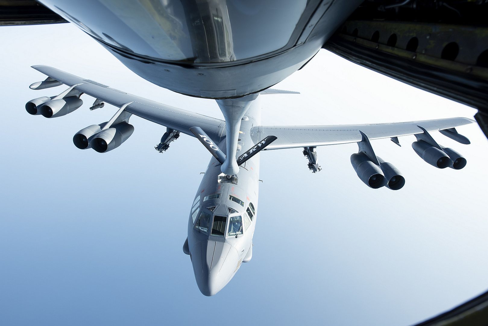 B 52H Stratofortress Assigned To The 5th Bomb Wing At Minot Air Force Base North Dakota Flies Below A KC 135 Stratotanker From The 100th Air Refueling Wing