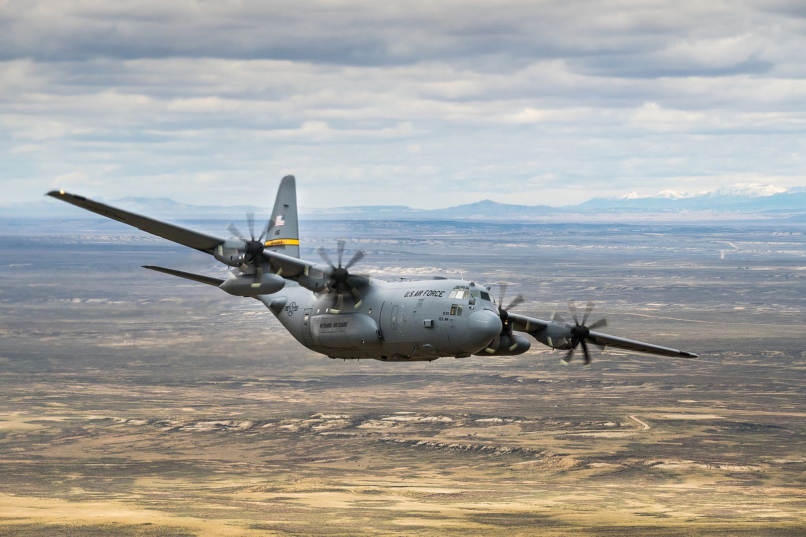 130 Hercules Flies Over The State Of Wyoming