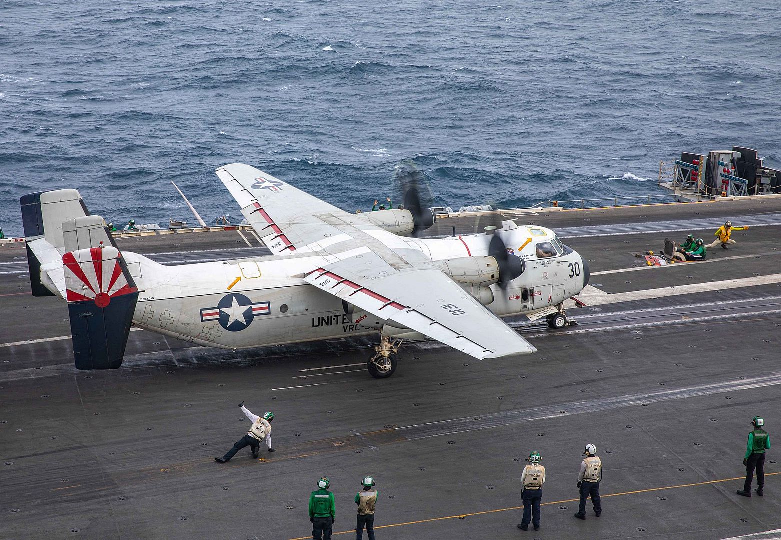 2A Greyhound Fleet Logistics Plane Attached To The Providers Of Fleet Logistics Support Squadron 30 Prepares For Launch On The Flight Deck Of Aircraft Carrier USS Ronald Reagan 2A Greyhound Fleet Logistics Plane Attached To The Providers Of Fleet Logistics Support Squadron 30 Prepares For Launch On The Flight Deck Of Aircraft Carrier USS Ronald Reagan