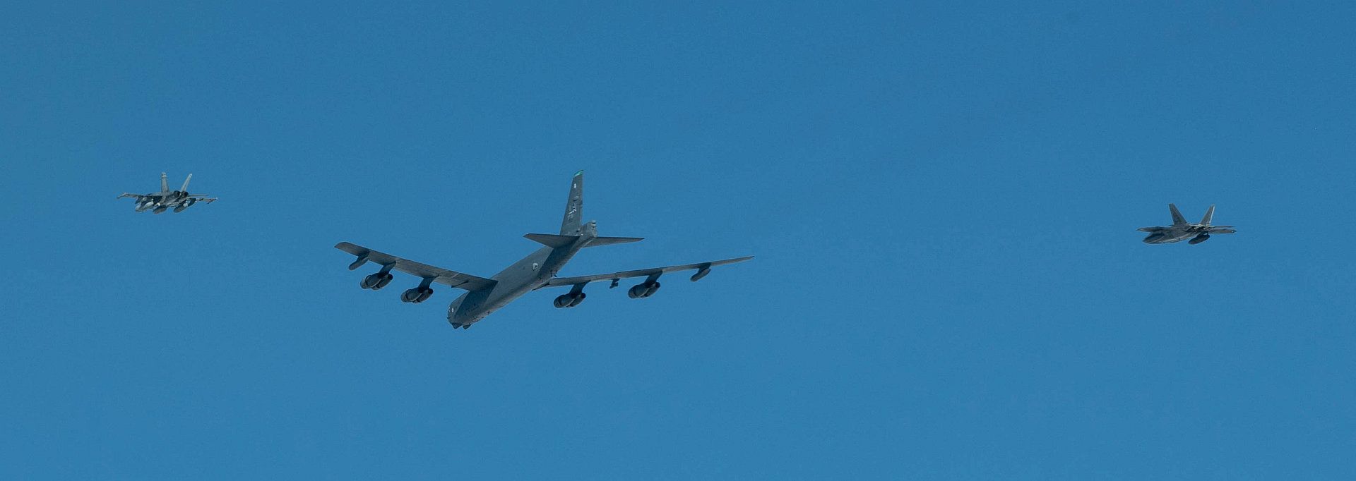 CF 18 Hornet And An American F 22 Raptor Escort A B 52 Stratofortress Bomber During A NORAD Air To Air Refuelling Exercise In The Arctic On June 14 2020 CF 18 Hornet And An American F 22 Raptor Escort A B 52 Stratofortress Bomber During A NORAD Air To Air Refuelling Exercise In The Arctic On June 14 2020