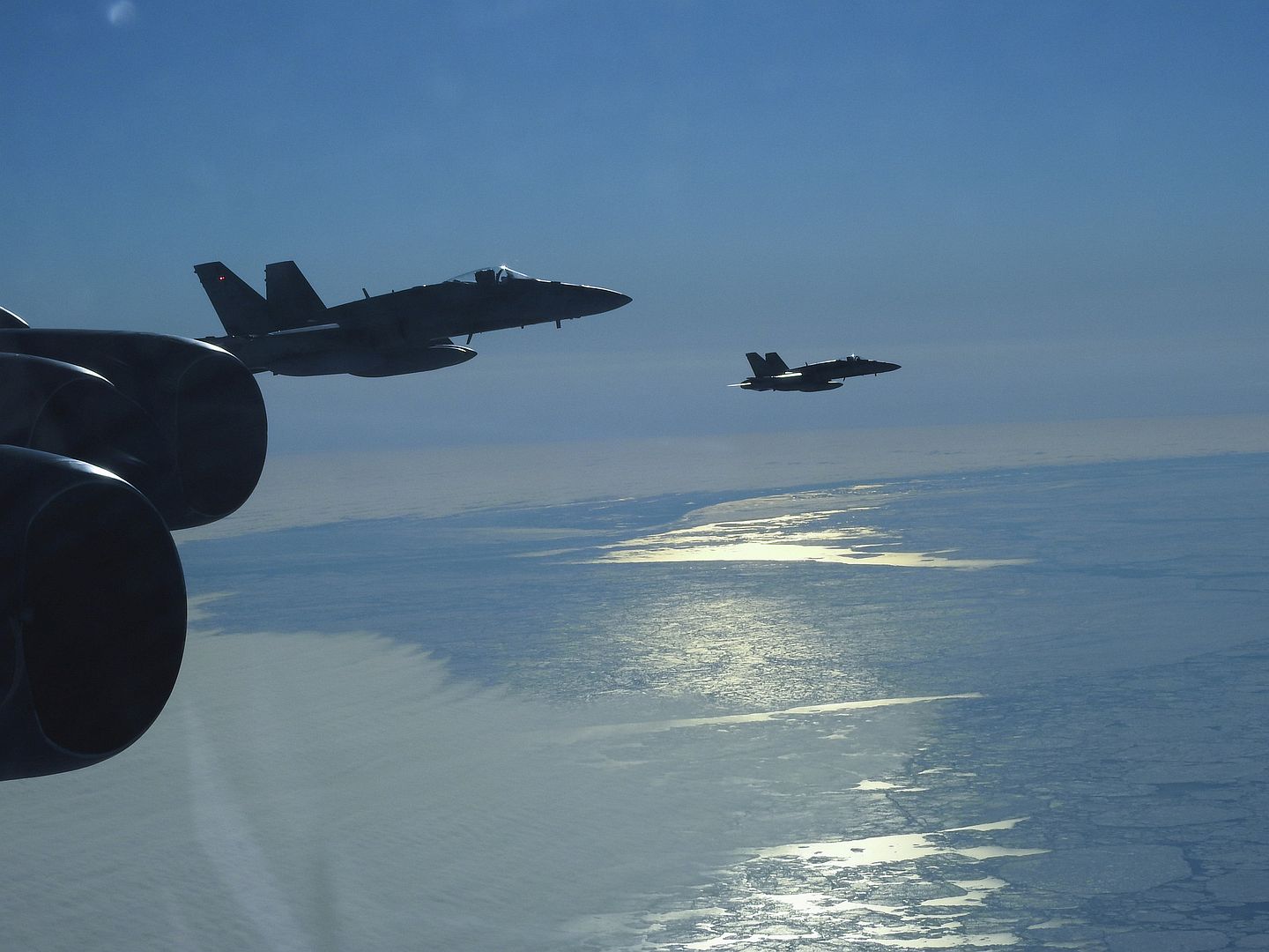 CF 18 Hornet Assigned To The Royal Canadian Air Force Escorts A B 52 Stratofortress During A North American Aerospace Defense Command