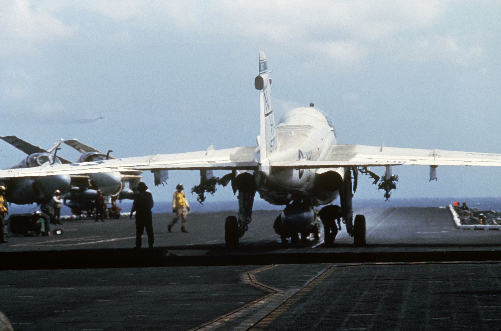 Catapult Crewmen Attach An A 6E Intruder Aircraft To A Catapult During Flight Operations Aboard The Nuclear Powered Aircraft Carrier USS ENTERPRISE 