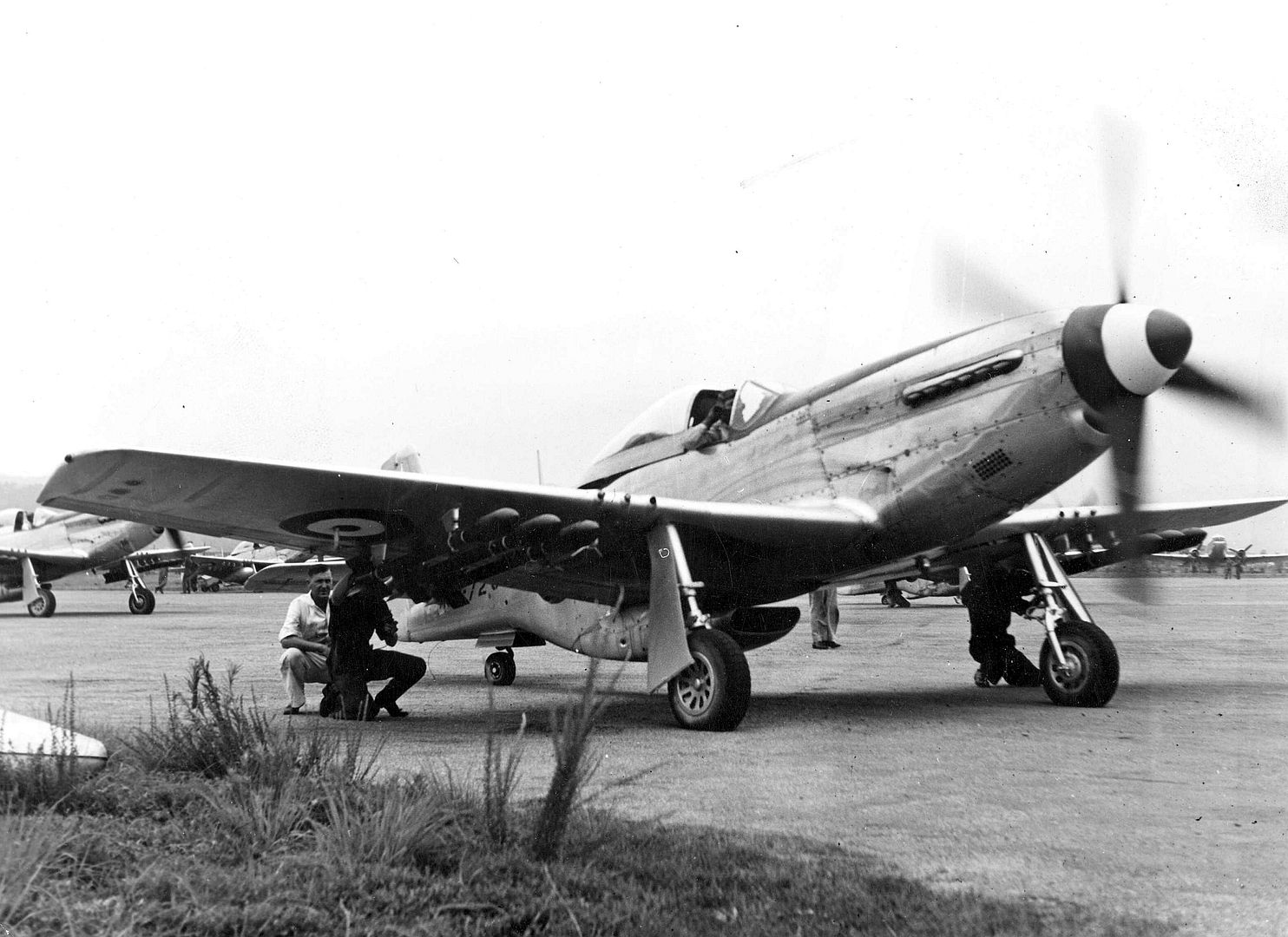 Checking The Rockets On A Mustang Prior To A Sortie Over Korea