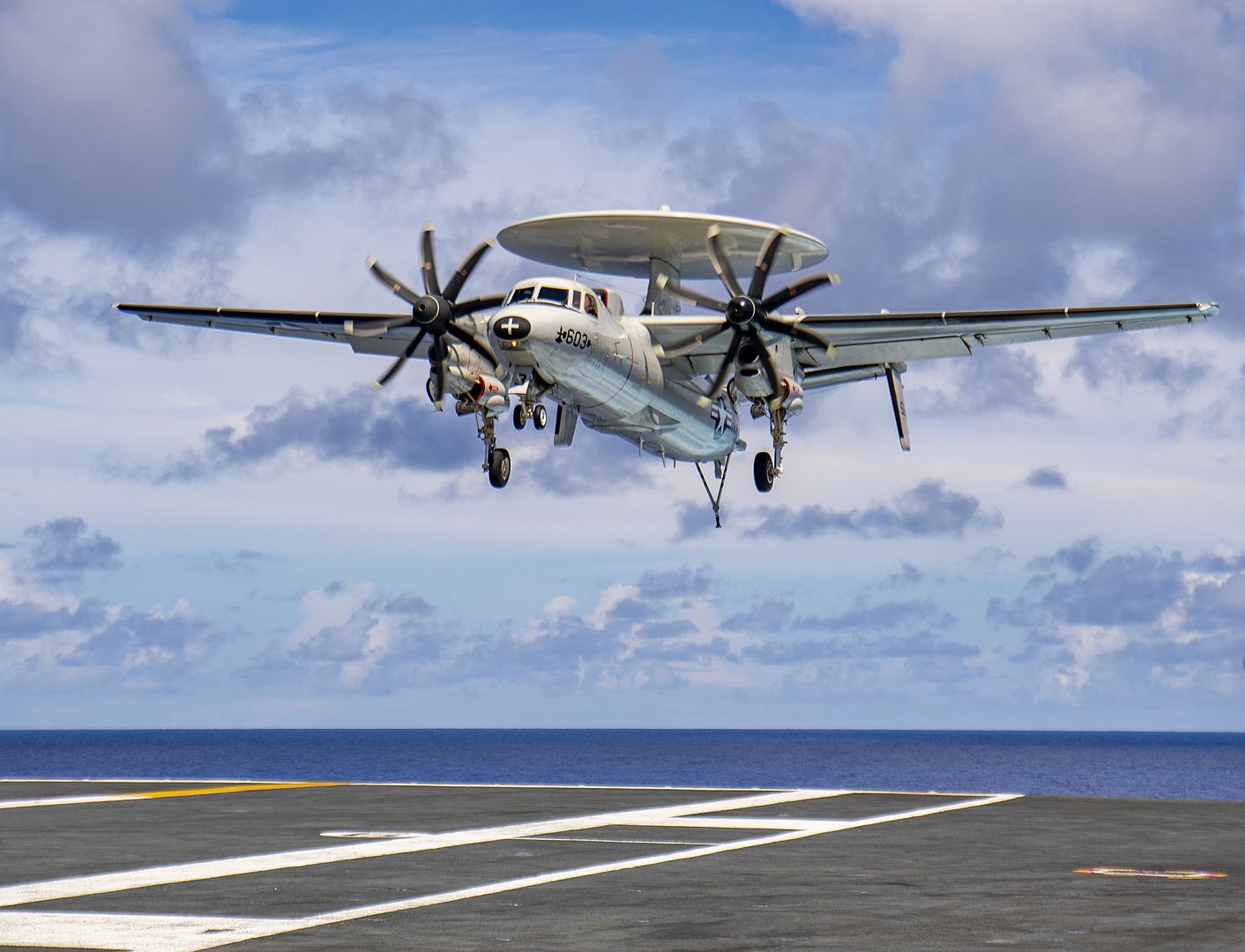 2C Hawkeye From The Sun Kings Of Carrier Airborne Early Warning Squadron 116 Prepares To Make An Arrested Landing On The Flight Deck Aboard The Aircraft Carrier USS Nimitz