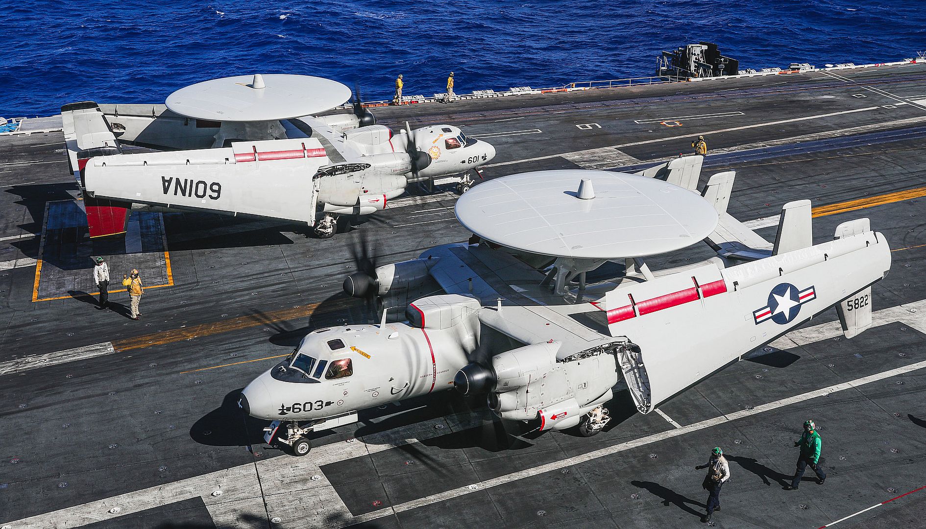2C Hawkeyes From The Sun Kings Of Carrier Airborne Early Warning Squadron 116 Prepare To Take Off From The Flight Deck Of The Aircraft Carrier USS Nimitz