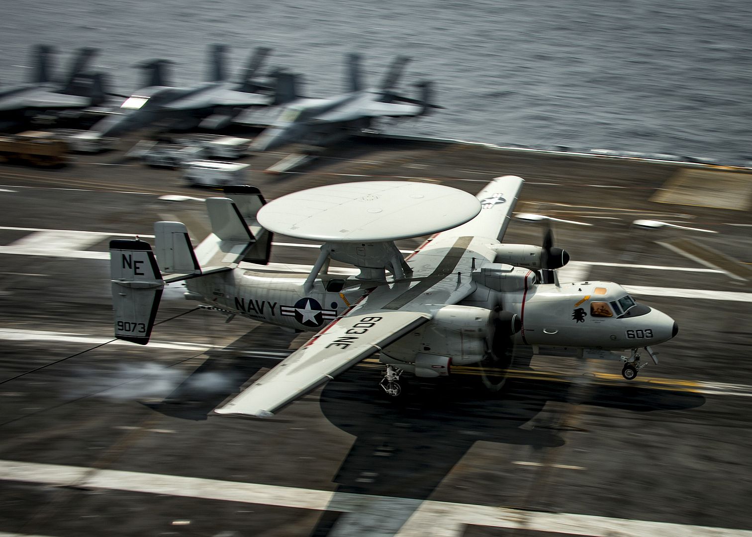 E 2D Hawkeye From The Black Eagles Of Carrier Airborne Early Warning Squadron 113 Lands On The Flight Deck Of The Nimitz Class Nuclear Aircraft Carrier USS Carl Vinson