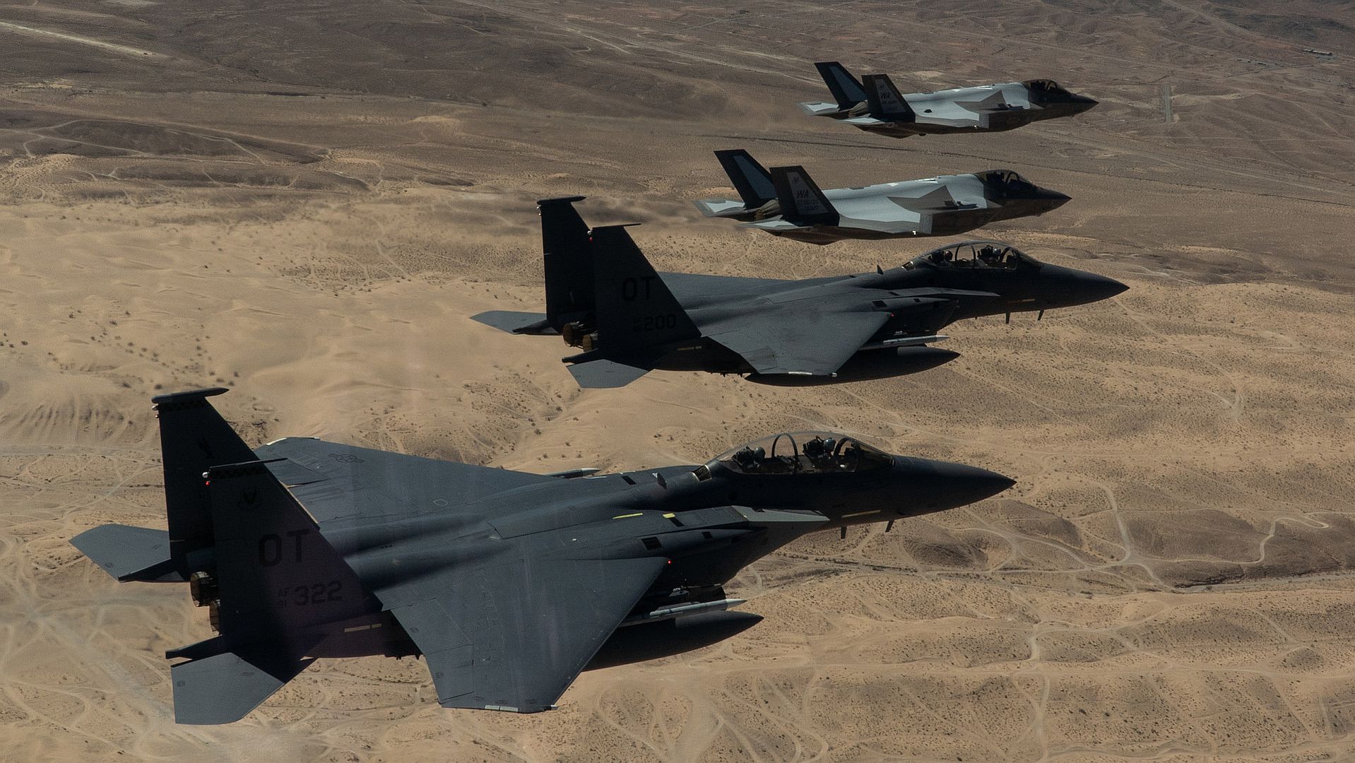 15E Strike Eagles Fly In A Formation After A Combat Training Mission In The Nevada Test And Training Range Air Space To Signify The History Of The 65th Aggressor Squadron