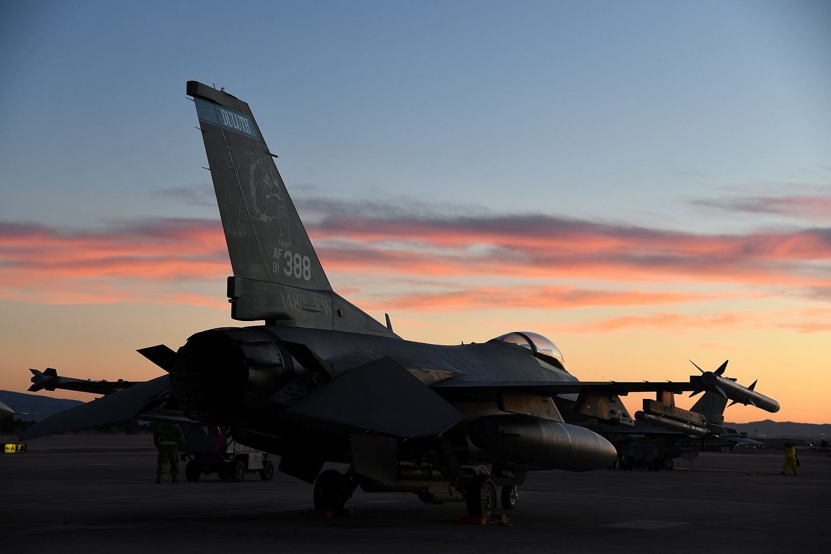 16 Fighting Falcon Assigned To The 148th Fighter Wing Minnesota Air National Is Parked At Sunset At Nellis Air Force Base Nevada On February 9 2022  16 Fighting Falcon Assigned To The 148th Fighter Wing Minnesota Air National Is Parked At Sunset At Nellis Air Force Base Nevada On February 9 2022