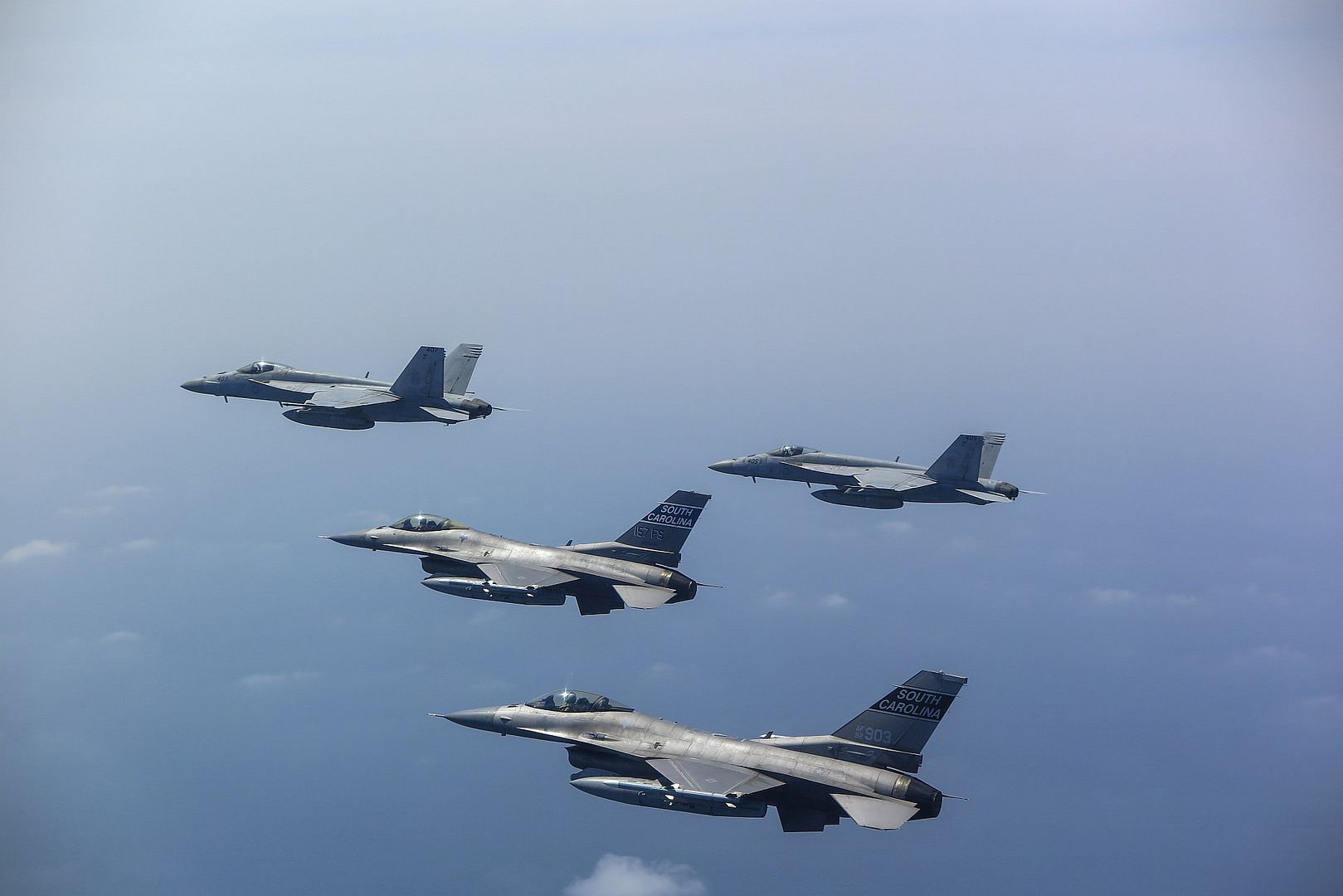 16 Fighting Falcon Fighter Jets From The 169th Fighter Wing Over The Arabian Sea