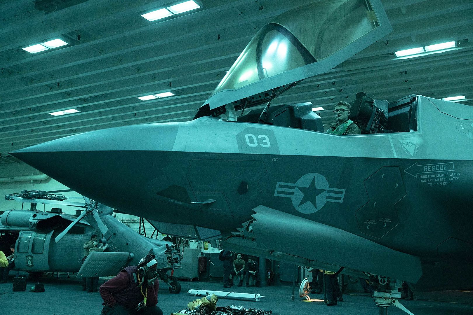 35B Lightning II Aircraft Assigned To Marine Strike Fighter Squadron 121 During A Move In The Hangar Bay Aboard Amphibious Assault Carrier USS Tripoli