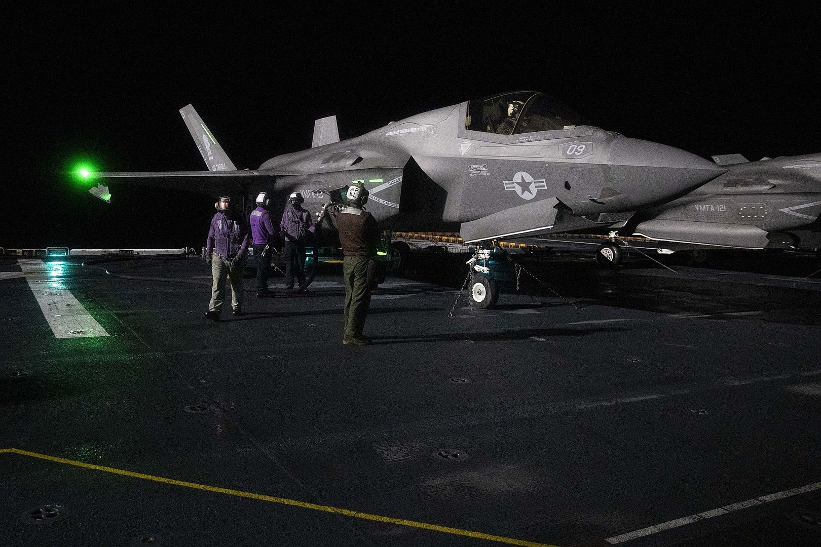 35B Lightning II Aircraft Assigned To Marine Strike Fighter Squadron 121 During Night Flight Operations Aboard Amphibious Assault Carrier USS Tripoli