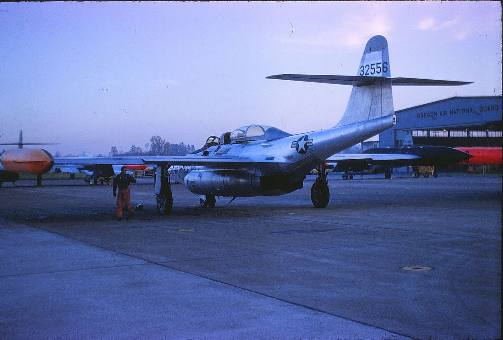 Interceptor Squadron Pilot Curtis Madson Wearing An Orange Flight Suit Interceptor Squadron Pilot Curtis Madson Wearing An Orange Flight Suit