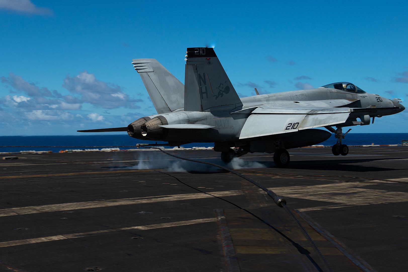  Makes An Arrested Landing On The Flight Deck Of The Aircraft Carrier USS Theodore Roosevelt