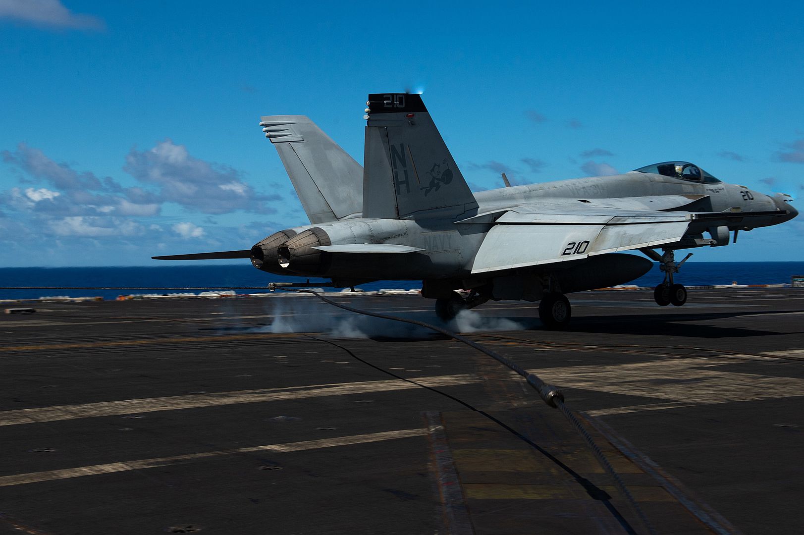Makes An Arrested Landing On The Flight Deck Of The Aircraft Carrier USS Theodore Roosevelt Makes An Arrested Landing On The Flight Deck Of The Aircraft Carrier USS Theodore Roosevelt