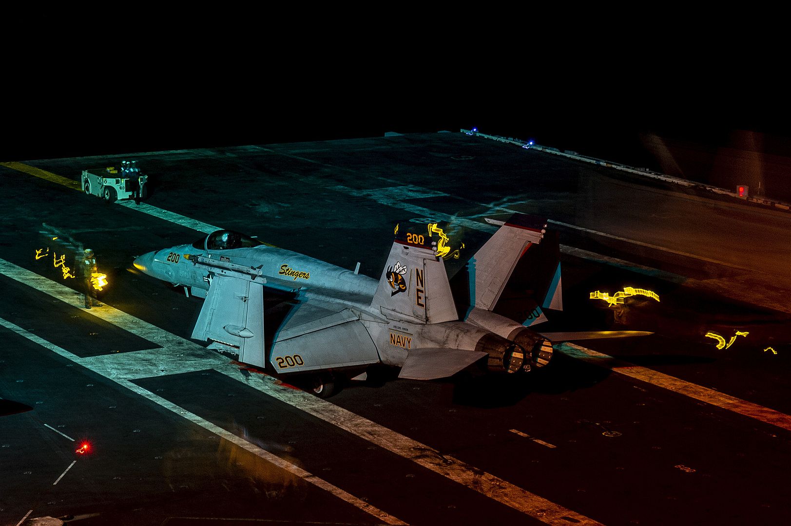 18E Super Hornet Assigned To The Stingers Of Strike Fighter Squadron 113 Conducts Night Flight Operations Aboard The Aircraft Carrier USS Carl Vinson