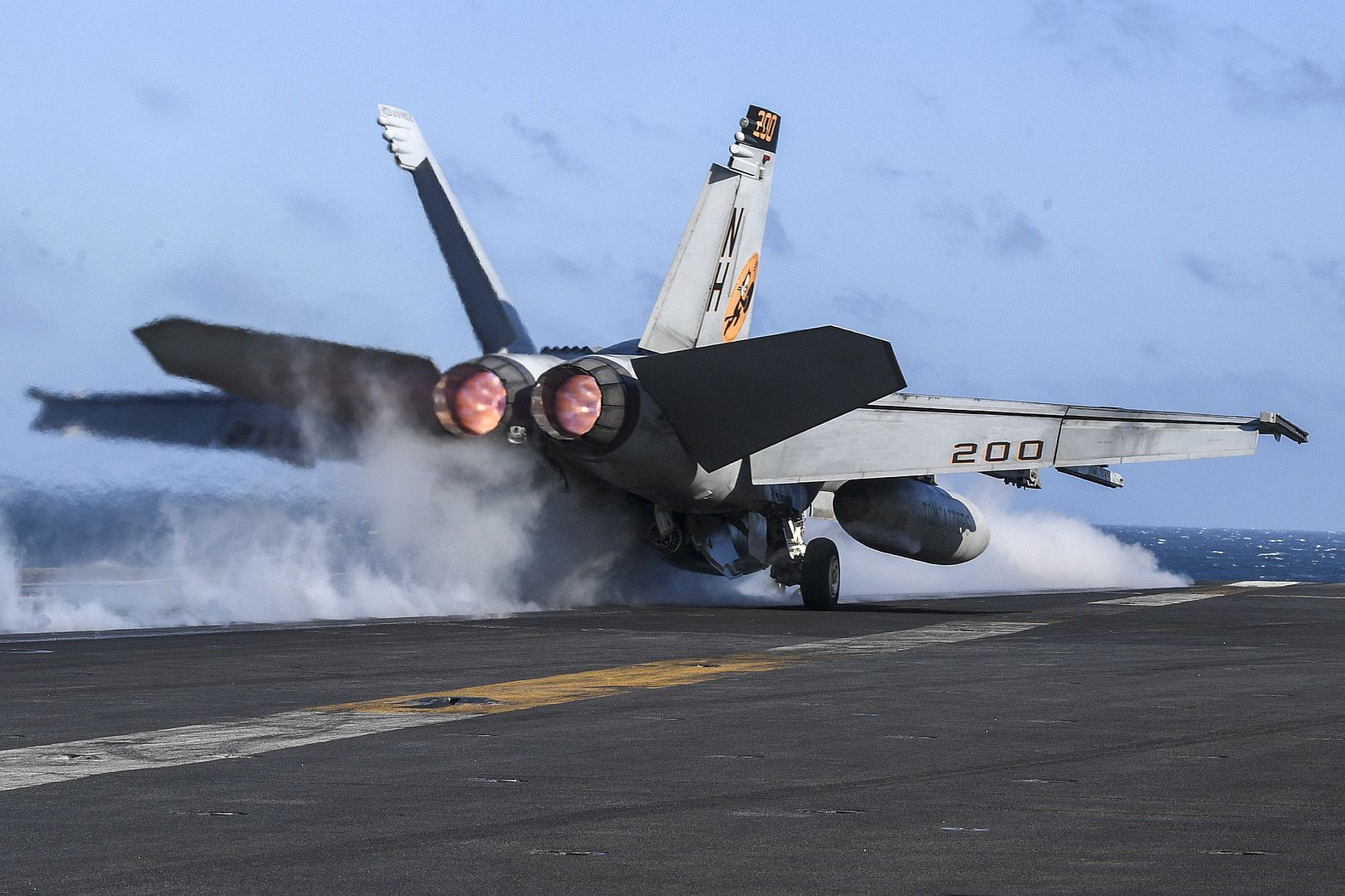 18E Super Hornet Assigned To The Tomcatters Of Strike Fighter Squadron VFA 31 Launches From The Flight Deck Of The Aircraft Carrier USS Theodore Roosevelt