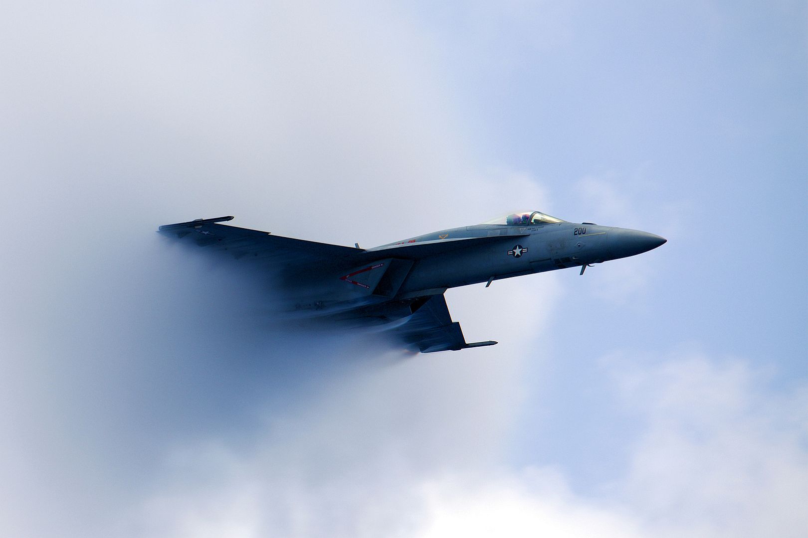 18E Super Hornet Attached To The Fighting Checkmates Of Strike Fighter Squadron 211 Breaks The Sound Barrier During An Air And Sea Power Demonstration July 3 20221 18E Super Hornet Attached To The Fighting Checkmates Of Strike Fighter Squadron 211 Breaks The Sound Barrier During An Air And Sea Power Demonstration July 3 20221