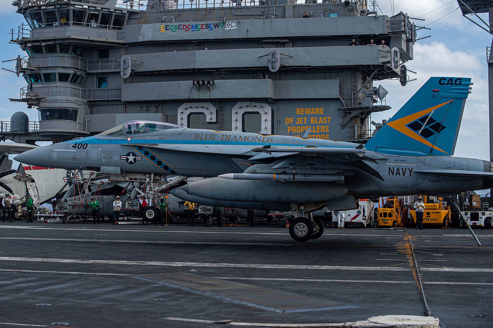 18E Super Hornet From The Blue Diamonds Of Strike Fighter Squadron 146 Makes An Arrested Landing Aboard The Aircraft Carrier USS Nimitz