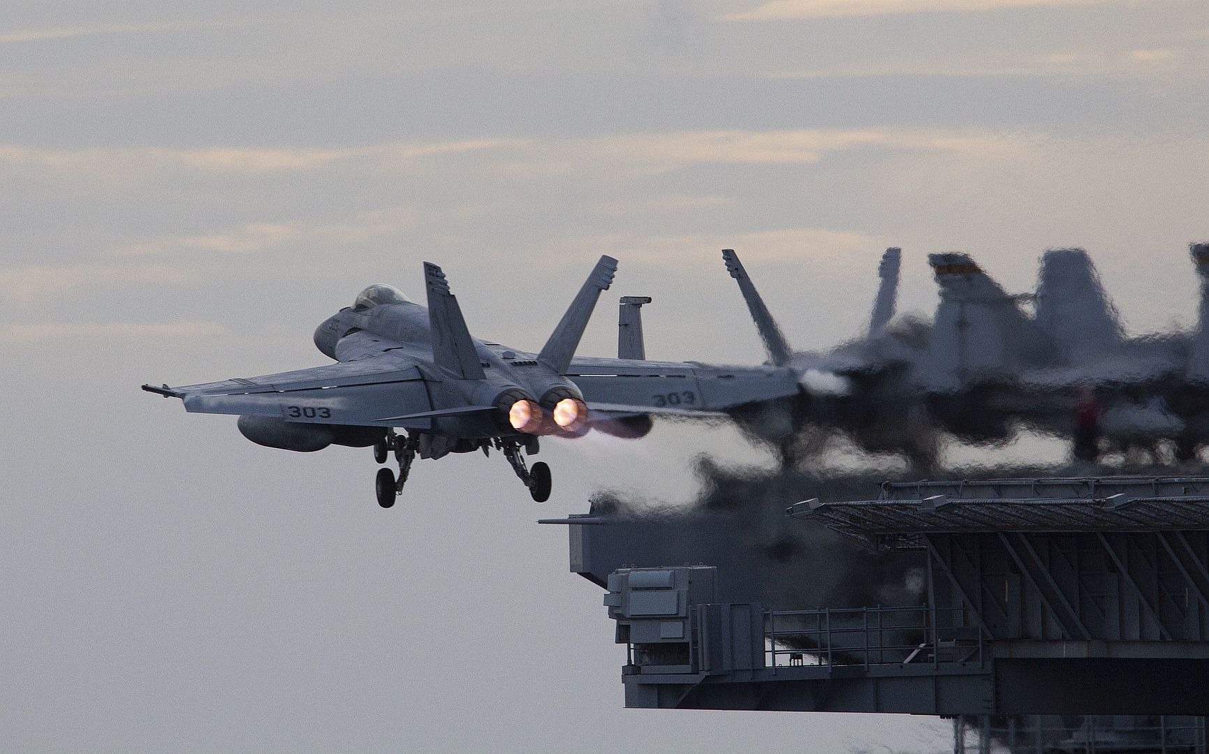 18E Super Hornet From The Kestrels Of Strike Fighter Squadron 137 Launches From The Flight Deck Of The Aircraft Carrier USS Nimitz