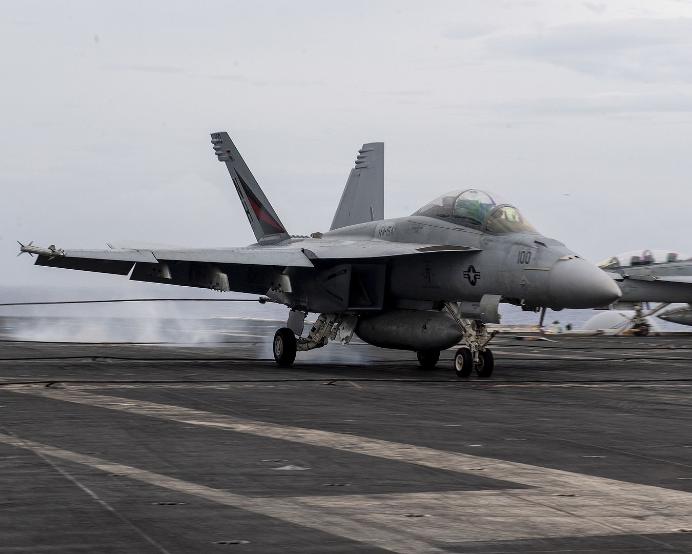  Lands On The Flight Deck Of The Aircraft Carrier USS Theodore Roosevelt