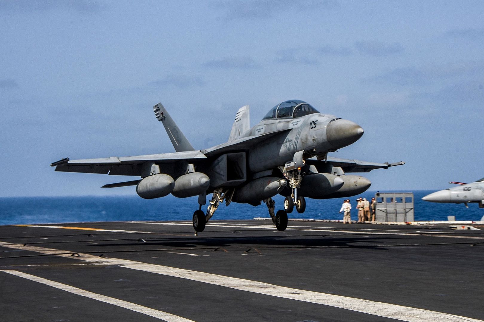 18F Super Hornet Fighter Jet Attached To The Diamondbacks Of Strike Fighter Squadron 102 Lands On The Flight Deck Of Aircraft Carrier USS Ronald Reagan