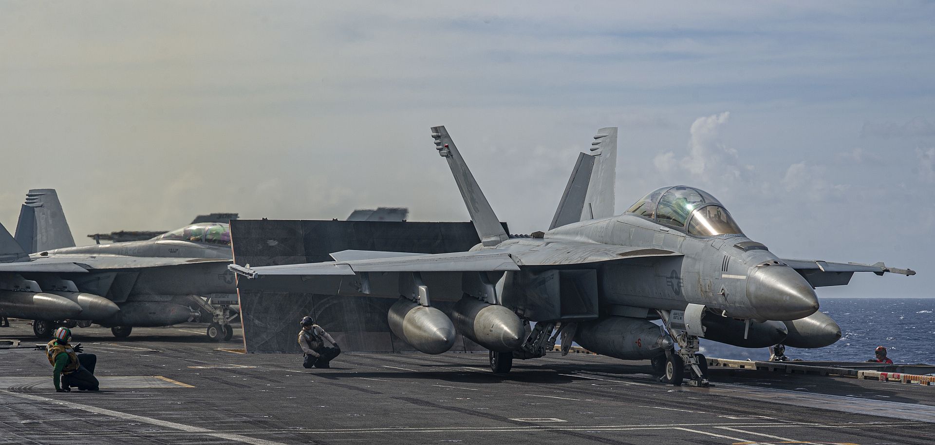 18F Super Hornet From The Fighting Redcocks Of Strike Fighter Squadron 22 Prepares To Launch From The Aircraft Carrier USS Nimitz