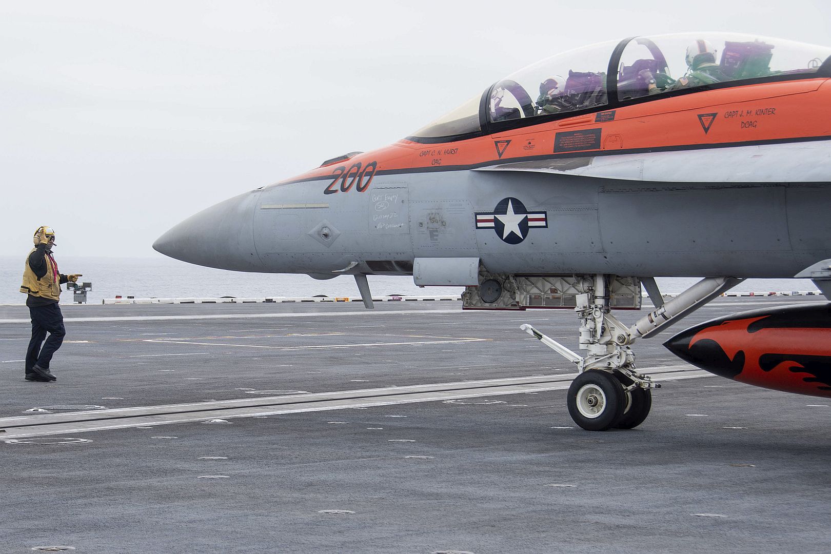 18F Super Hornet From The Mighty Shrikes Of Strike Fighter Squadron 94 Taxis On The Flight Deck Of The Aircraft Carrier USS Nimitz