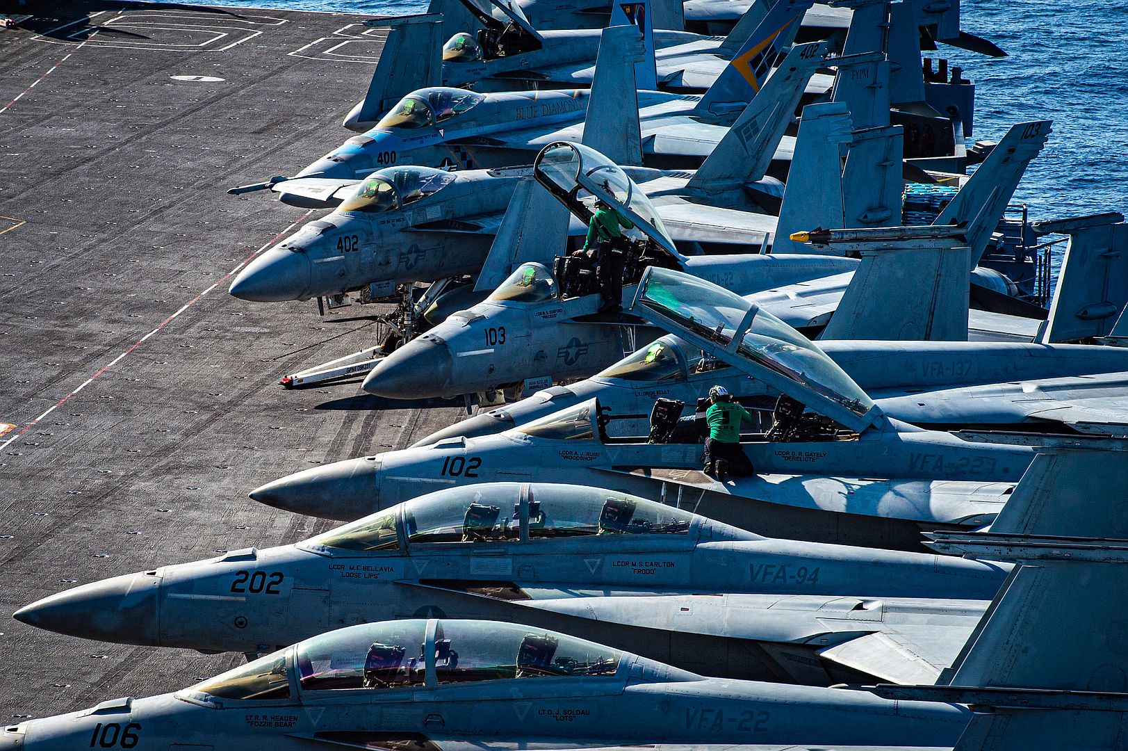 18F Super Hornets From The Fighting Redcocks Of Strike Fighter Squadron 22 On The Flight Deck Of The Aircraft Carrier USS Nimitz