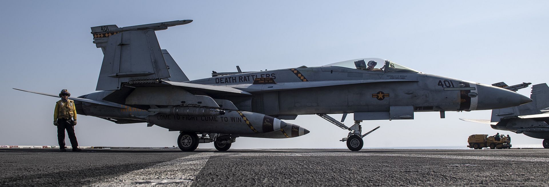 FA 18C Hornet From The Death Rattlers Of Marine Fighter Attack Squadron VMFA 323 Queues For Launch On The Flight Deck Of The Aircraft Carrier USS Nimitz