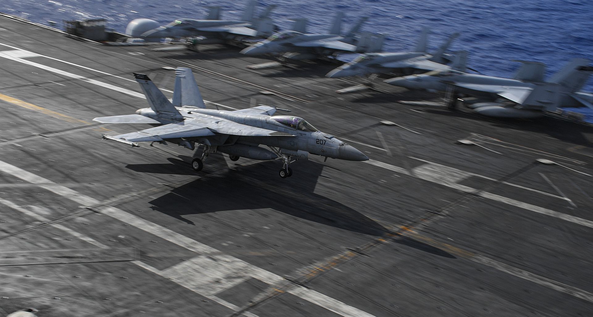 FA 18E Super Hornet Assigned To The Tomcatters Of Strike Fighter Squadron 31 Lands On The Flight Deck Of The Aircraft Carrier USS Theodore Roosevelt