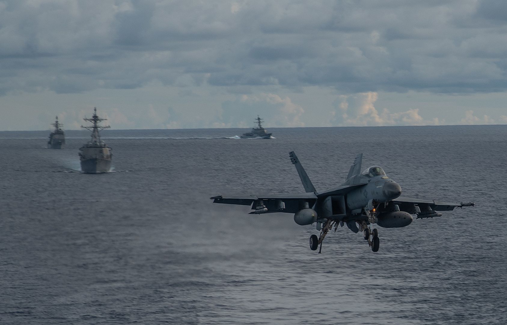 FA 18E Super Hornet Attached To The Dambusters Of Strike Fighter Squadron VFA 195 Approaches The Flight Deck Of The Navy S Only Forward Deployed Aircraft Carrier USS Ronald Reagan