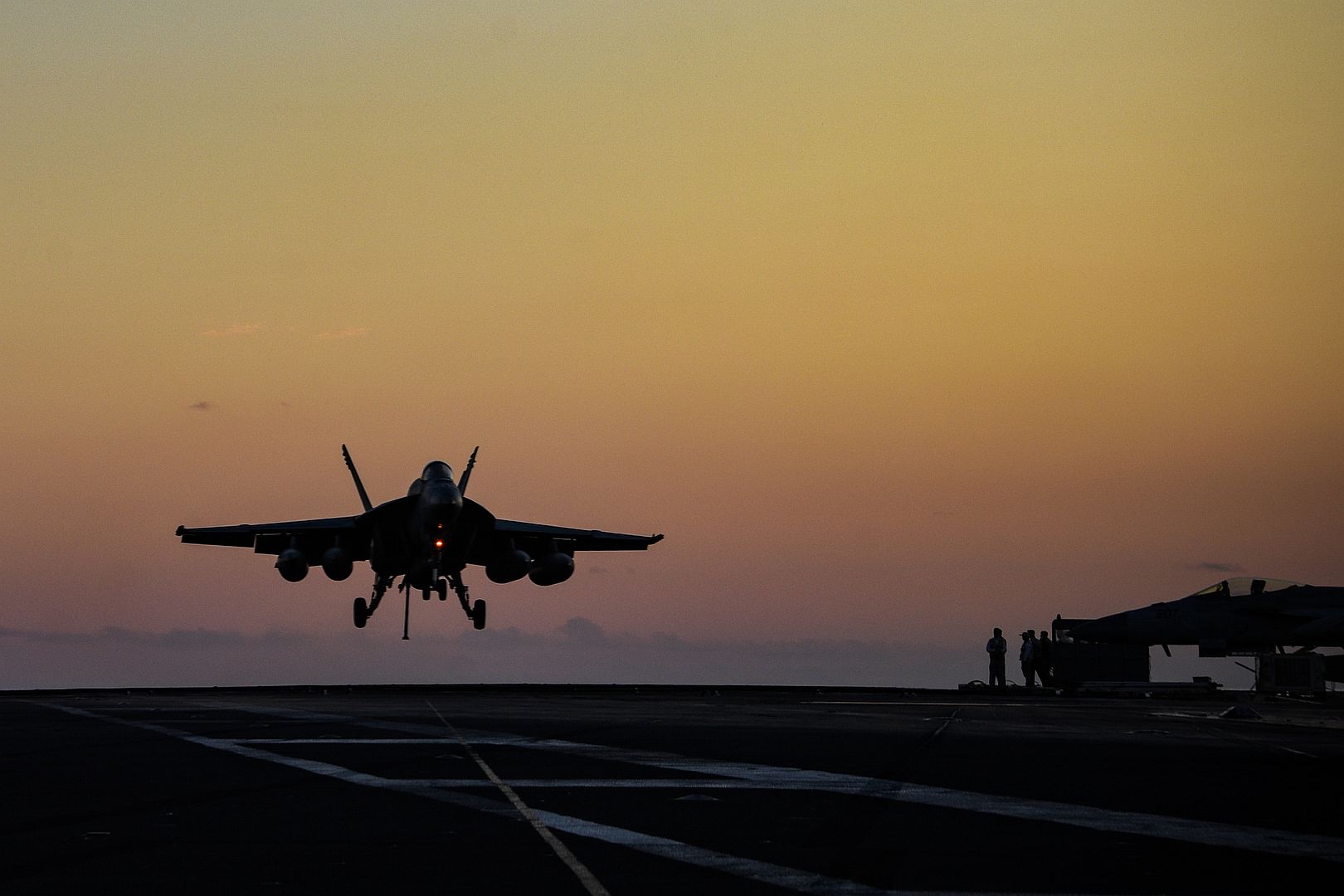 FA 18E Super Hornet Attached To The Royal Maces Of Strike Fighter Squadron VFA 27 Prepares To Land On The Flight Deck Of The Navys Only Forward Deployed Aircraft Carrier USS Ronald Reagan