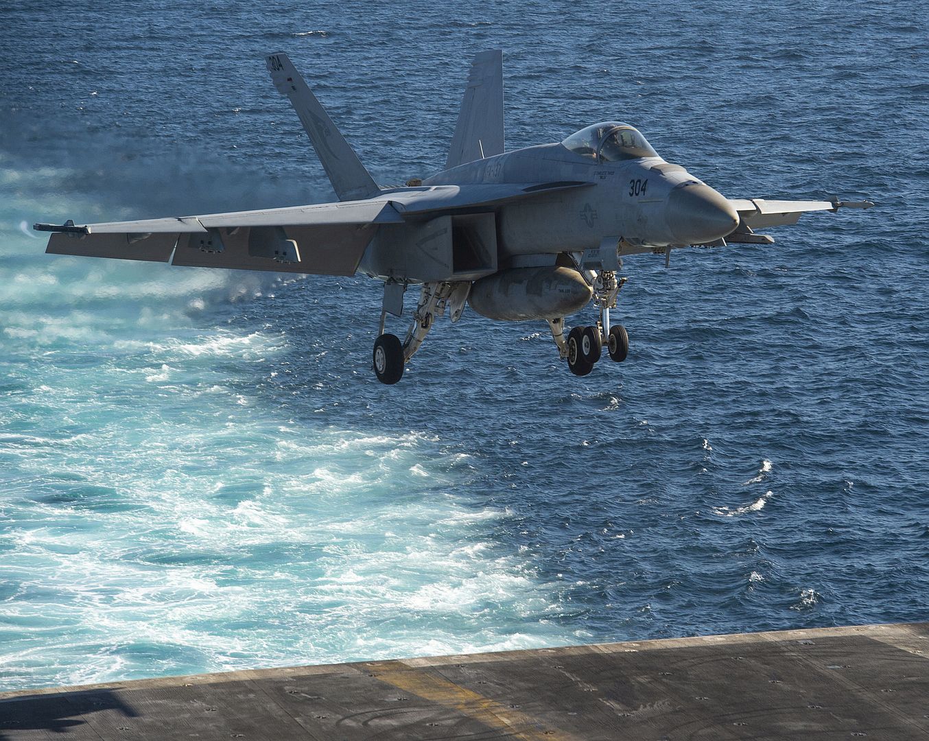 FA 18E Super Hornet From The Kestrels Of Strike Fighter Squadron VFA 137 Approaches The Flight Deck Of The Aircraft Carrier USS Nimitz