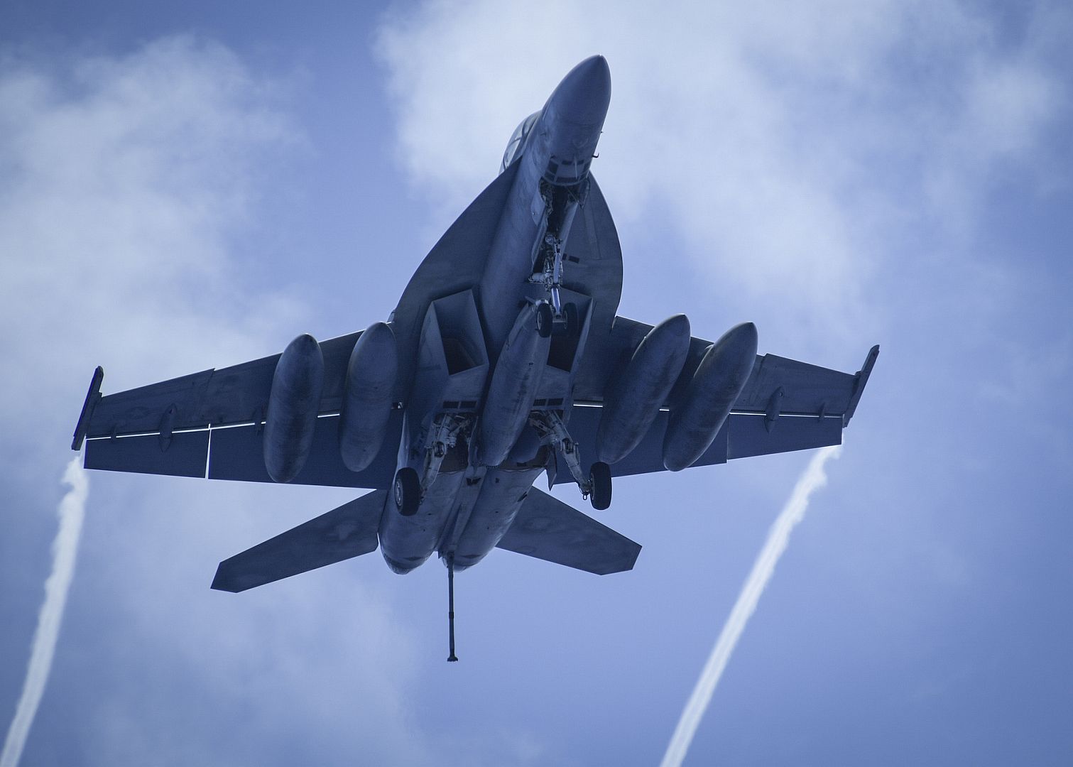 FA 18F Super Hornet Assigned To The Black Knights Of Strike Fighter Squadron 154 Flies Over The Aircraft Carrier USS Theodore Roosevelt