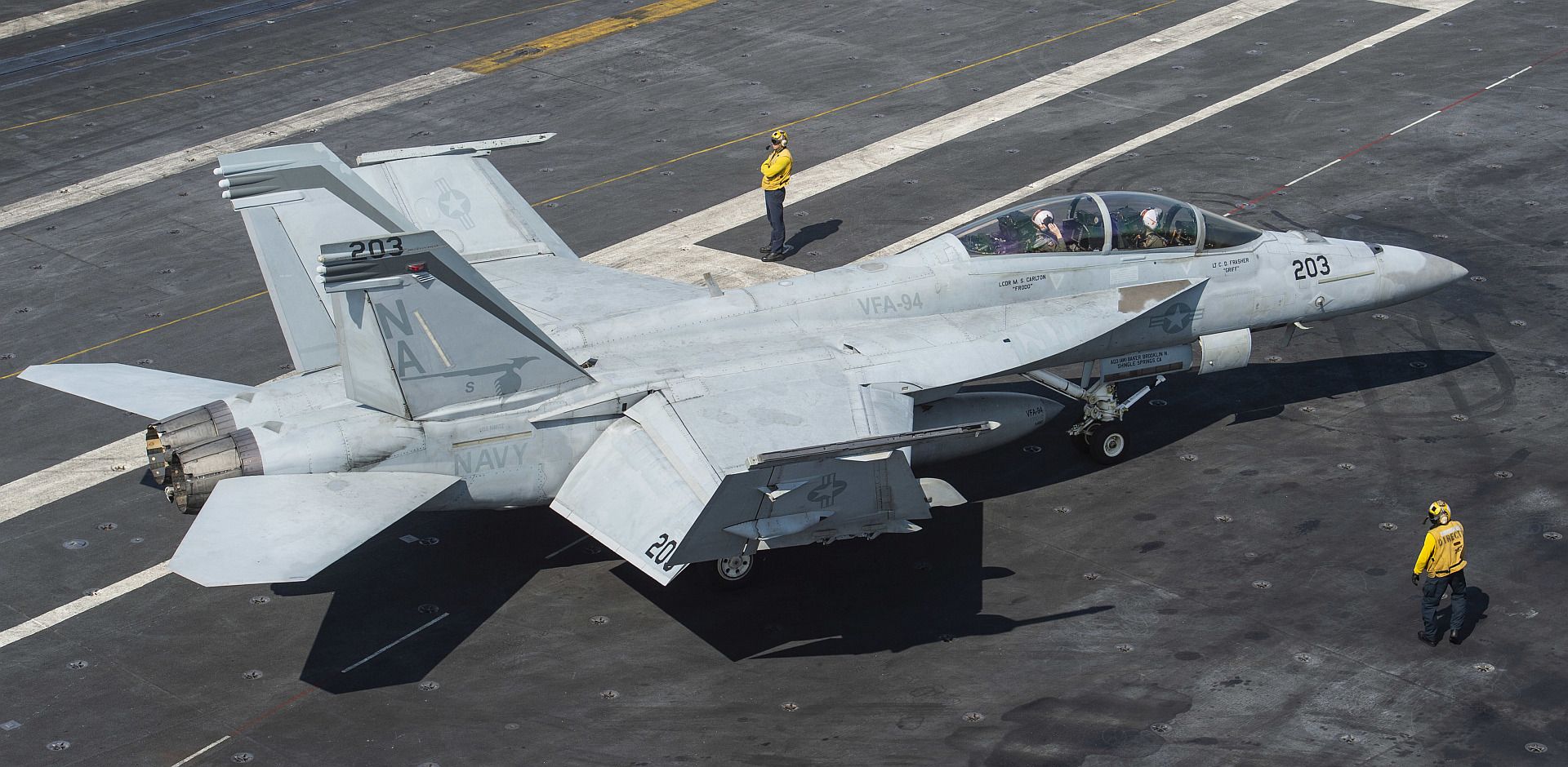 FA 18F Super Hornet From The Mighty Shrikes Of Strike Fighter Squadron 94 Taxis Across The Flight Deck Of The Aircraft Carrier USS Nimitz