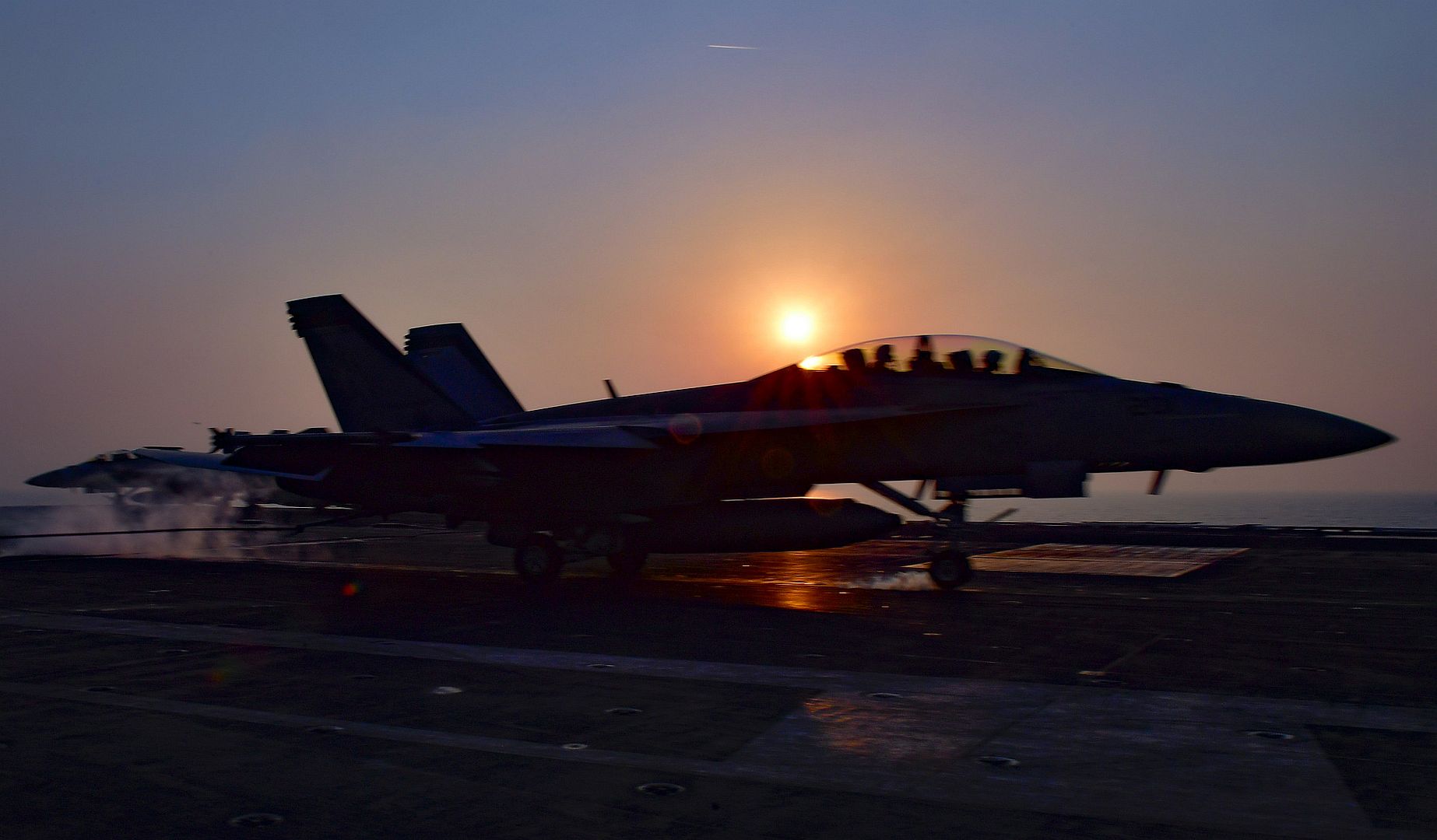 FA 18F Super Hornet From The Mighty Shrikes Of Strike Fighter Squadron VFA 94 Makes An Arrested Gear Landing On The Flight Deck Aboard The Aircraft Carrier USS Nimitz